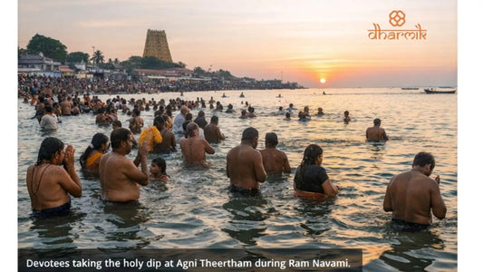 Devotees performing a sacred holy dip at Agni Theertham in Rameswaram during sunrise on Ram Navami, with the Ramanathaswamy Temple visible in the background.