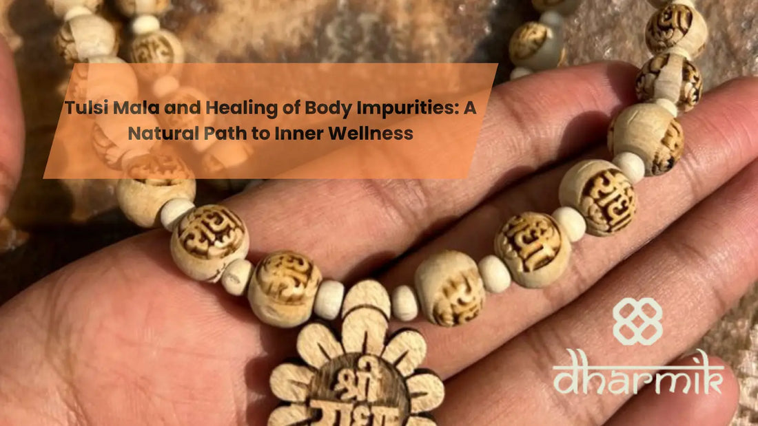 Tulsi mala beads with carved sacred symbols held in hand, representing spiritual healing, purity, and inner wellness.