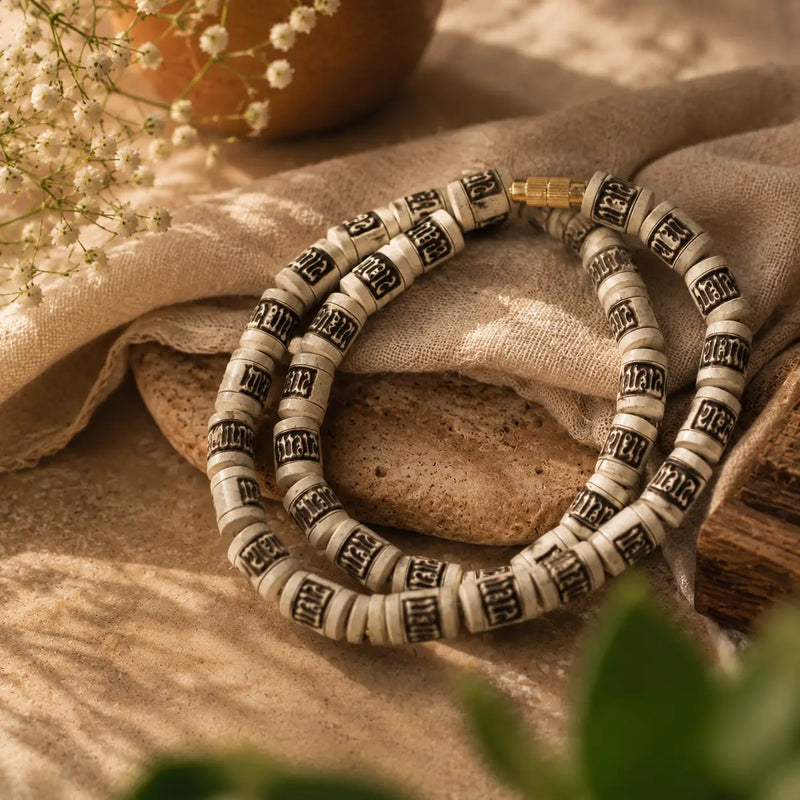 Radha Naam Tulsi Kanthi Mala placed on cloth 8mm beads